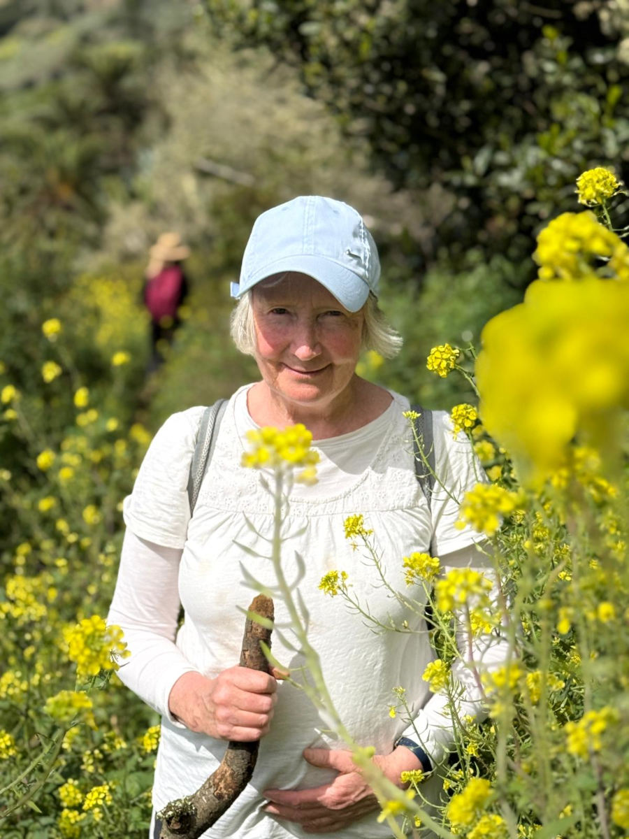 profile image of Betty O'Toole standing in a meadow