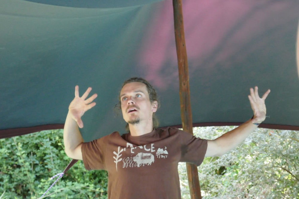 profile image of Jano teaching workshop in a tent