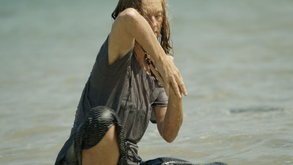 profile image of Tara Brandel dancing in water